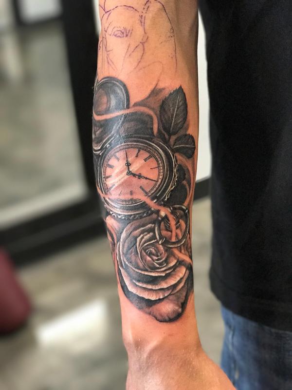 Pocket watch and rose
