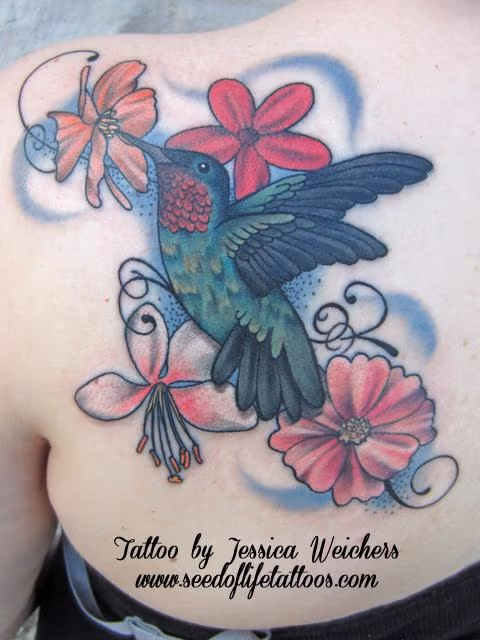Feminine hummingbird and floral piece