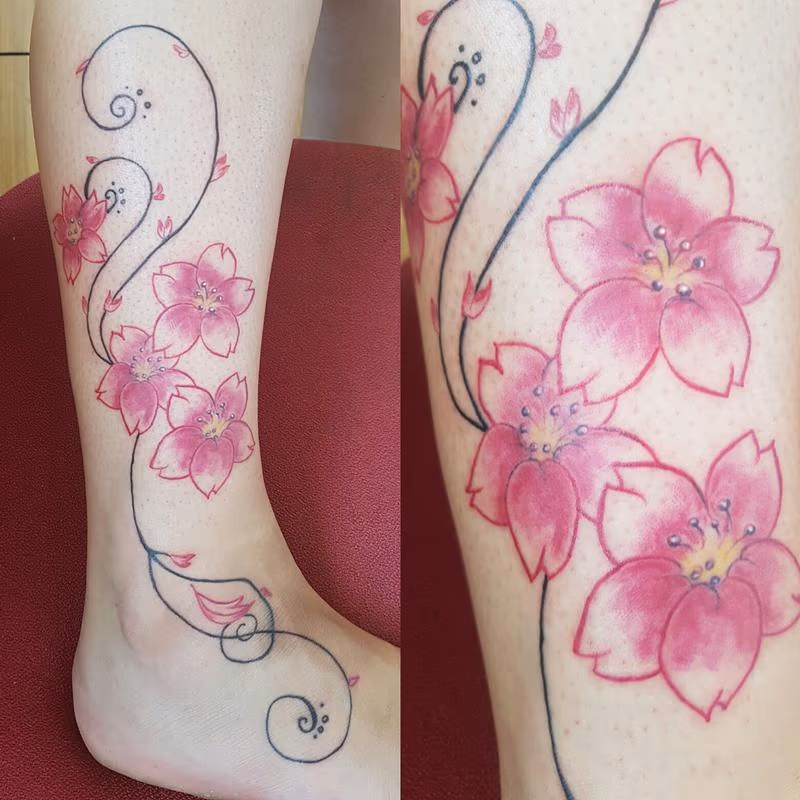 Pretty and Feminine Cherry Blossoms Tattoo