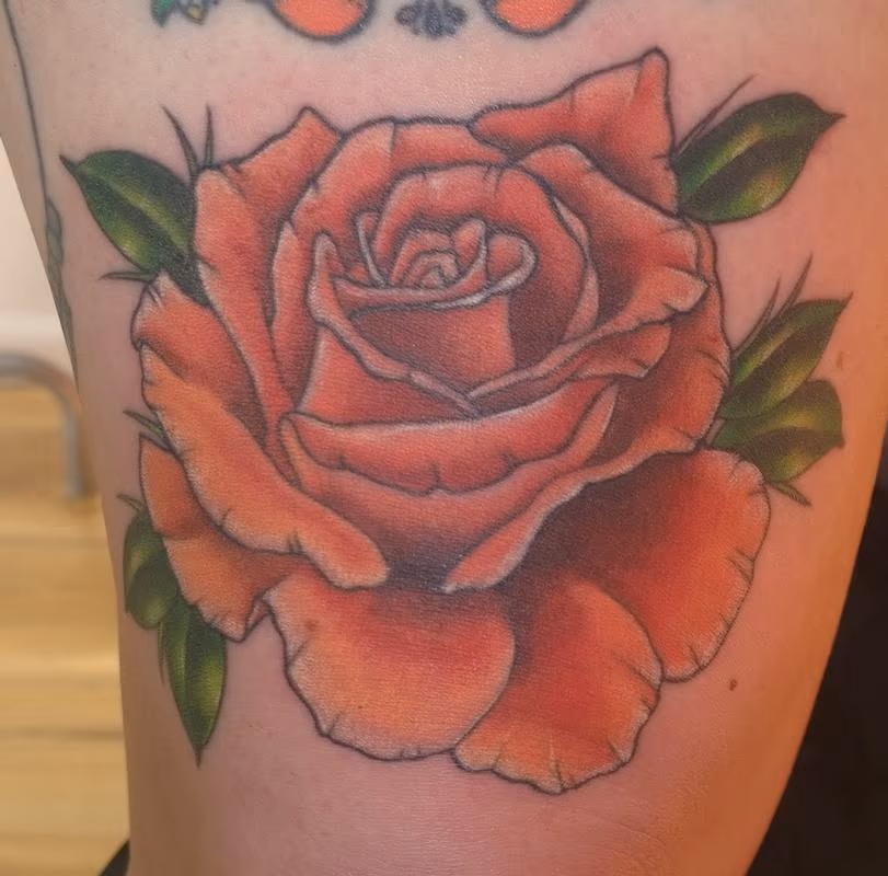 Beautiful Feminine Rose Tattoo