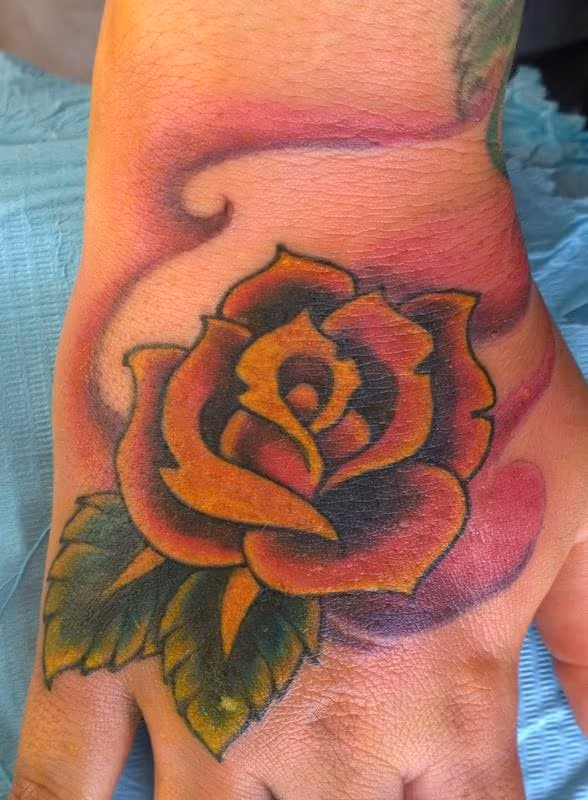 Colorful Rose Hand Tattoo