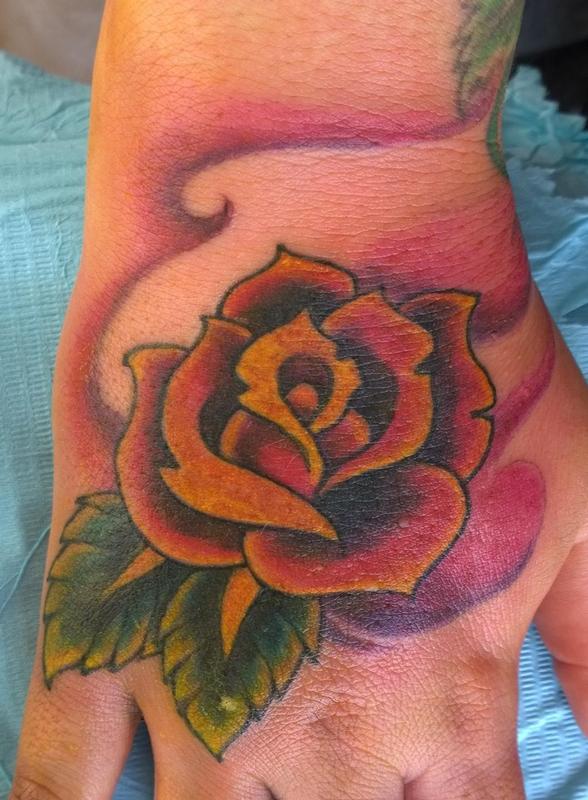 Colorful Rose Hand Tattoo