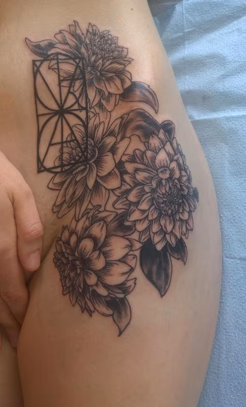 Feminine Fine Line Flower Tattoo