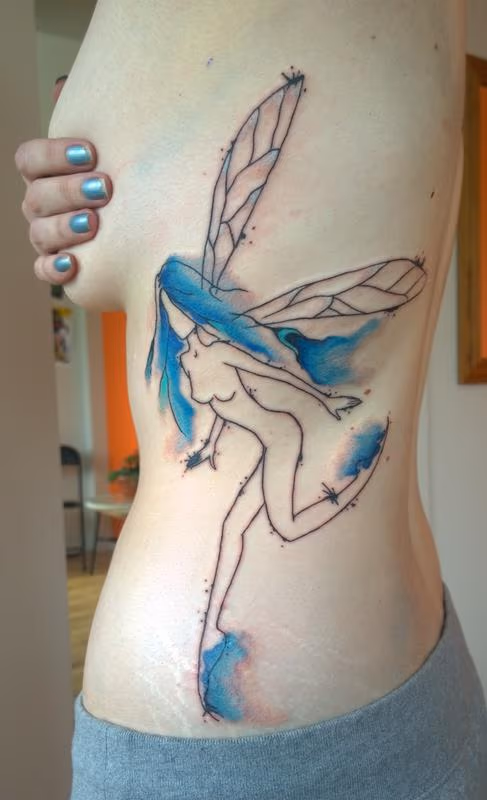 Watercolor Feminine Fairy Tattoo