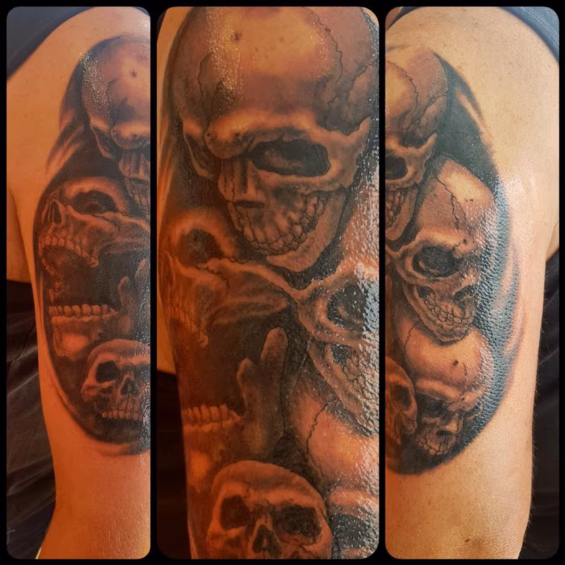 Black and Gray Skull Half-Sleeve Tattoo