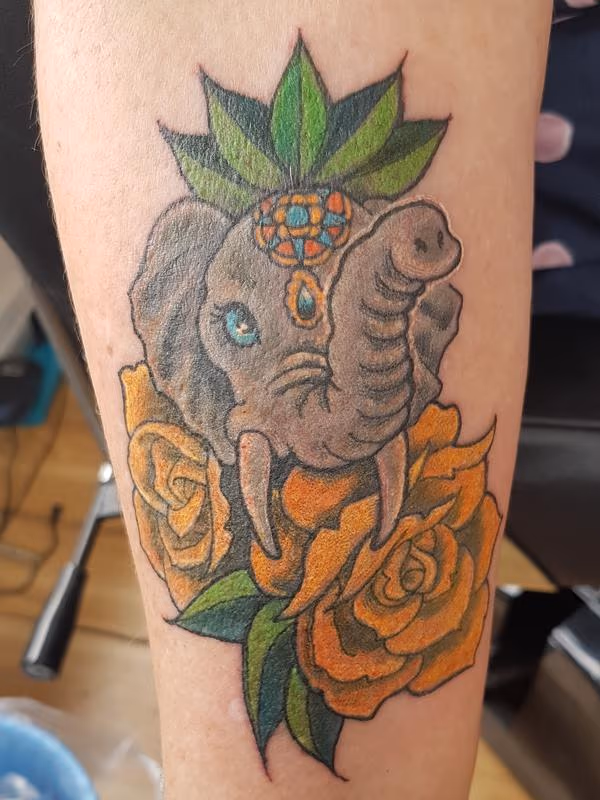 Cute Feminine Elephant Flower Tattoo