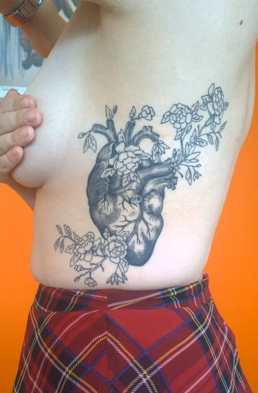 Feminine Floral Anatomical Heart Tattoo