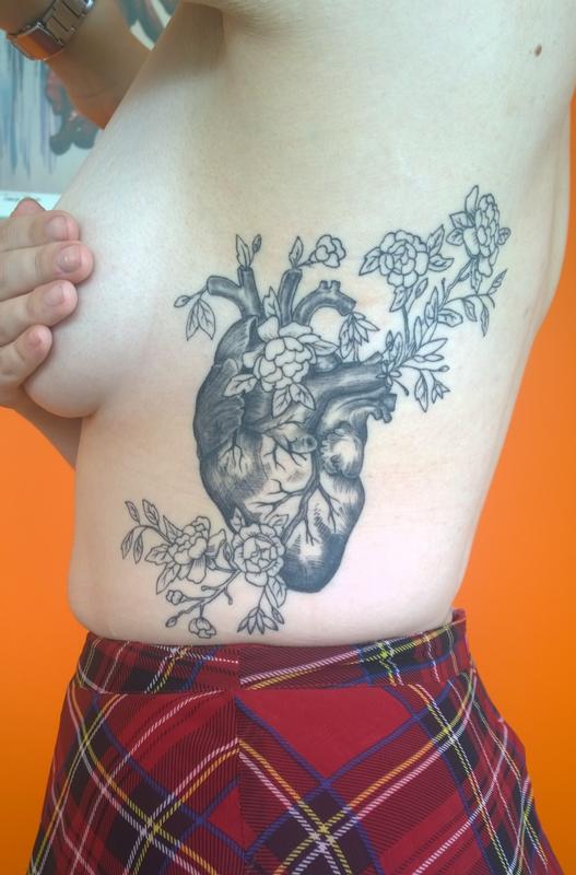 Feminine Floral Anatomical Heart Tattoo