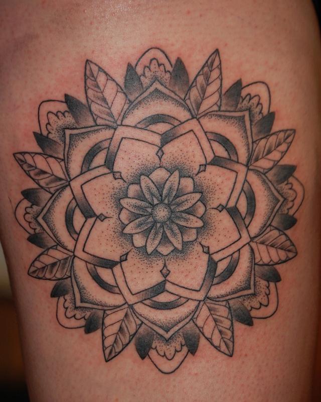 Black and grey, stiplism mandala tattoo