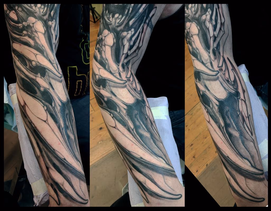 Bone Forearm Sleeve Tattoo
