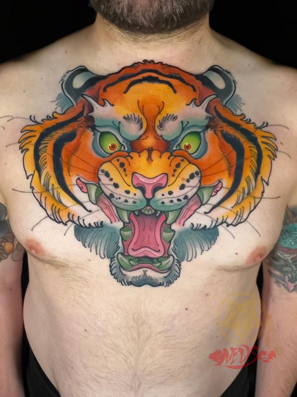 Tiger chest tattoo