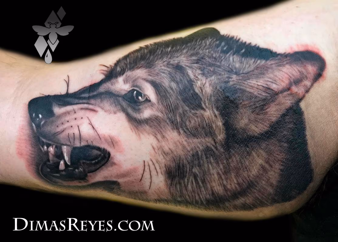 Black and grey Wolf tattoo