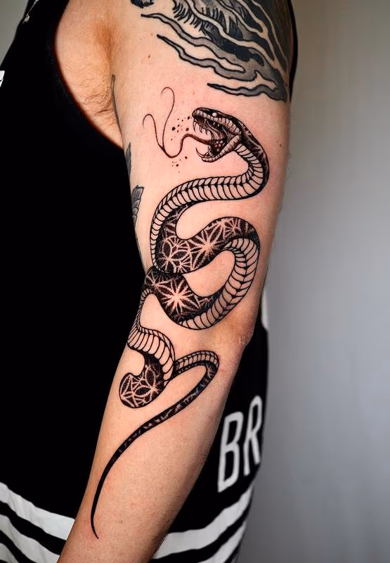 Snake arm tattoo