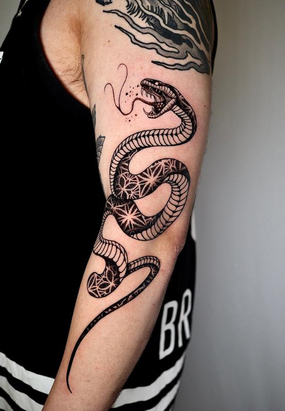 Snake arm tattoo