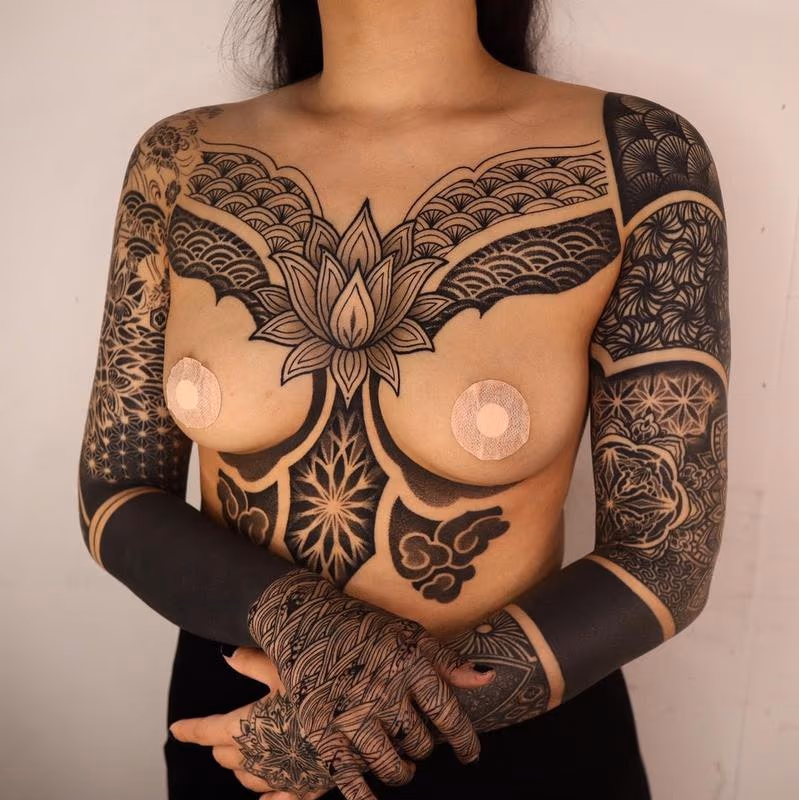Chest and Sleeves Blackwork Pattern Tattoos
