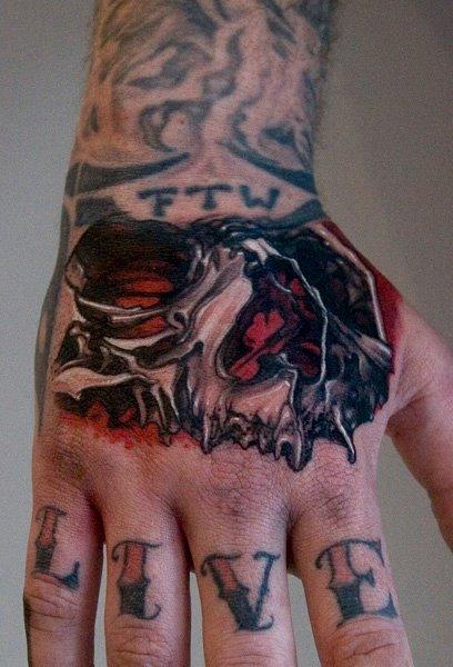 skull hand tattoo