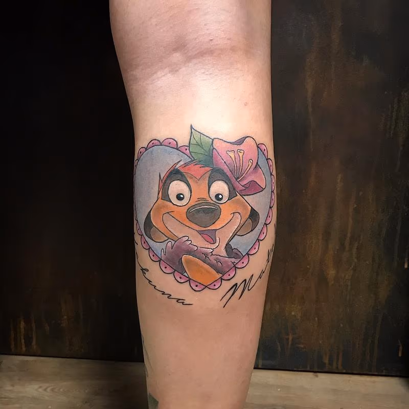 Timon Tattoo in Color with Hakuna Matata Lettering