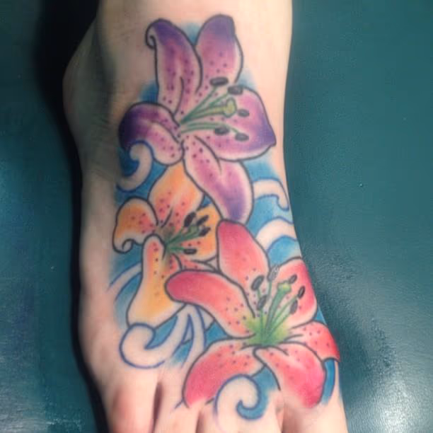 Flower foot tattoo