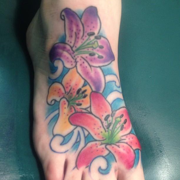 Flower foot tattoo