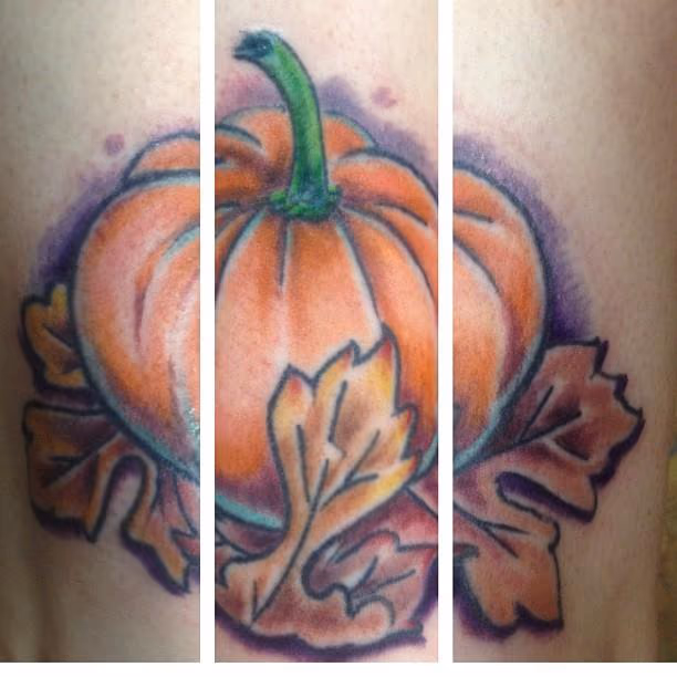 Pumpkin and fall leaves tattoo