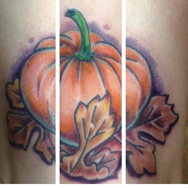 Pumpkin and fall leaves tattoo