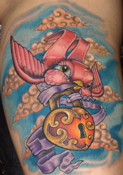 Bird and Locket Tattoo