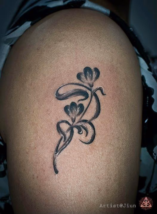 Black and Grey Flower Tattoo