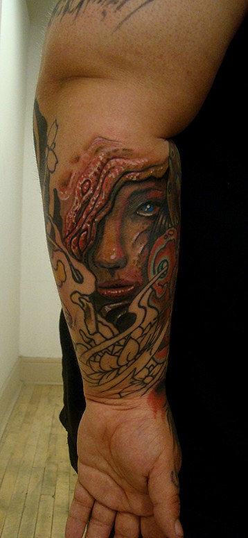 this piece is on one of my former co workers. we wanted to do a small fill in piece, which started as kind of a stream of concious style black and grey, but by the time we got a second sitting I rethought about what I wanted as an artist and we came up with this. super fun. in a perfect i'd get one more session to bring out some more rips higher up. who knows??? -=)