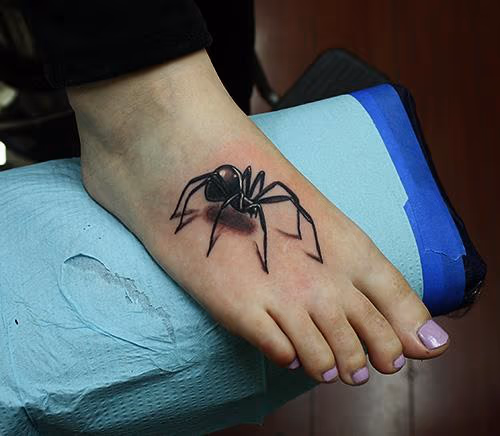 black widow spider tattoo