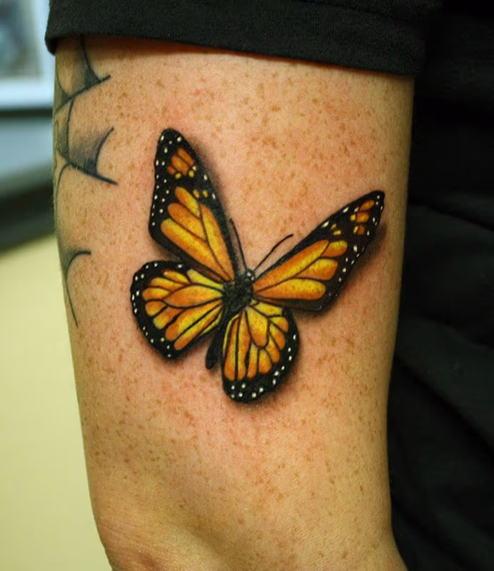 Monarch butterfly tattoo