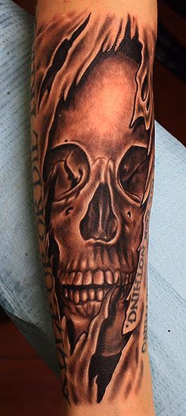 ripping skull tattoo