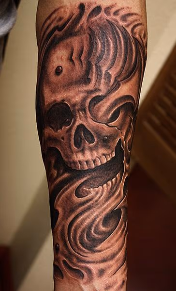 Bio-organic skull tattoo