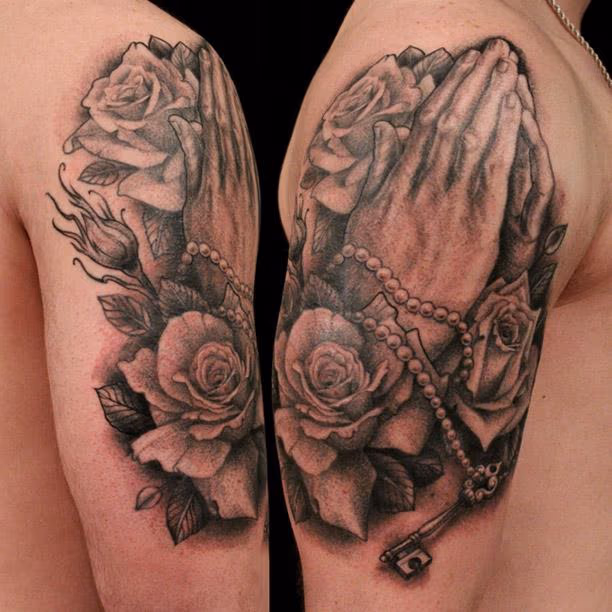 praying hands and roses