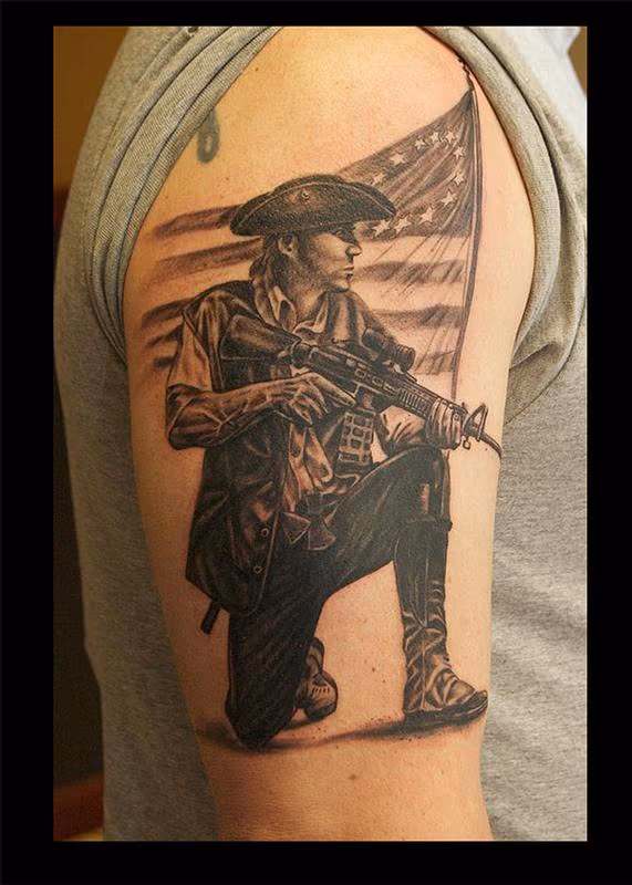 Black and Gray Minuteman Tattoo