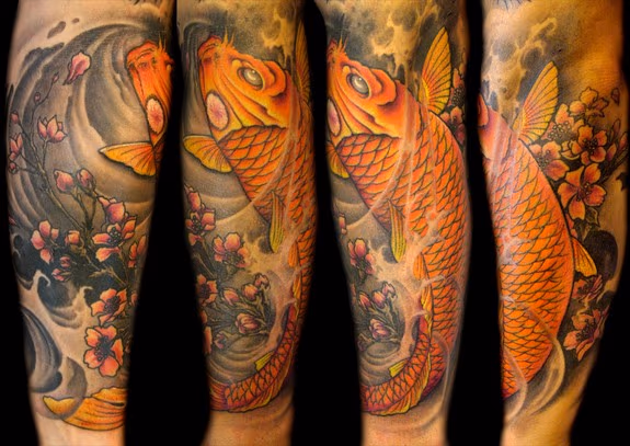 Full color Koi fish half sleeve tattoo.