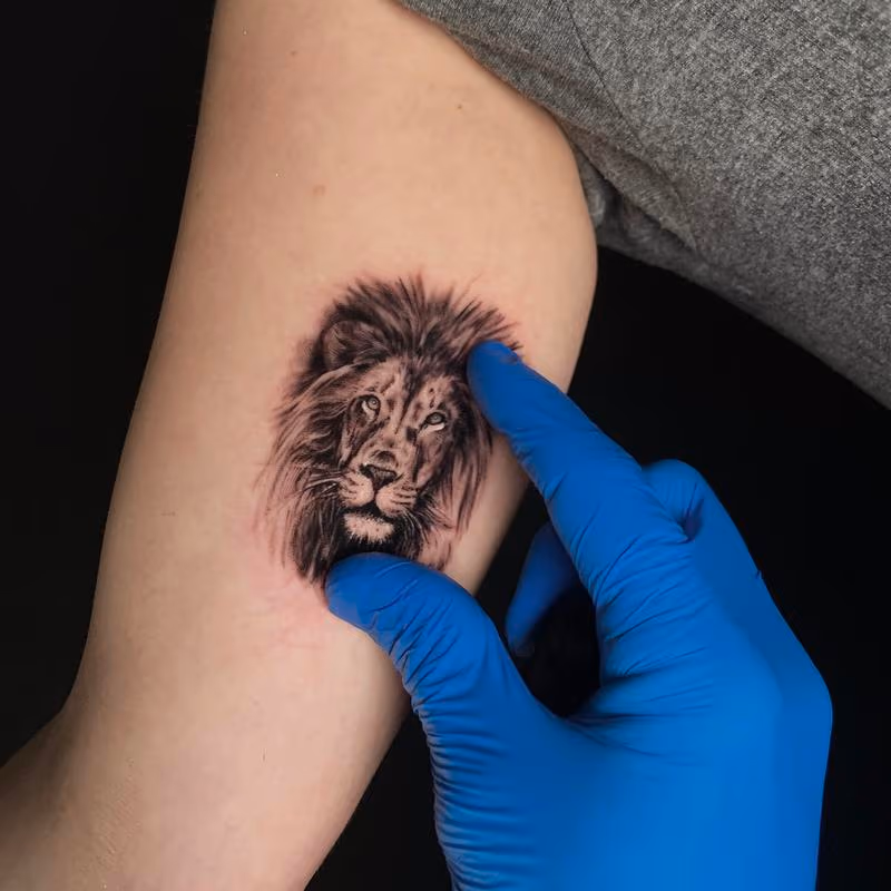Micro Lion Tattoo