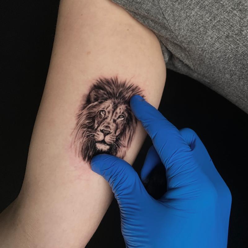 Micro Lion Tattoo