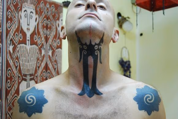 Hand Tapped Throat Tattoo
