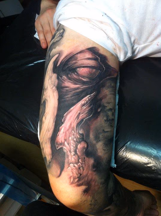 Bio eye leg tattoo