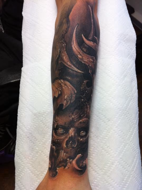 skull forearm half sleeve tattoo