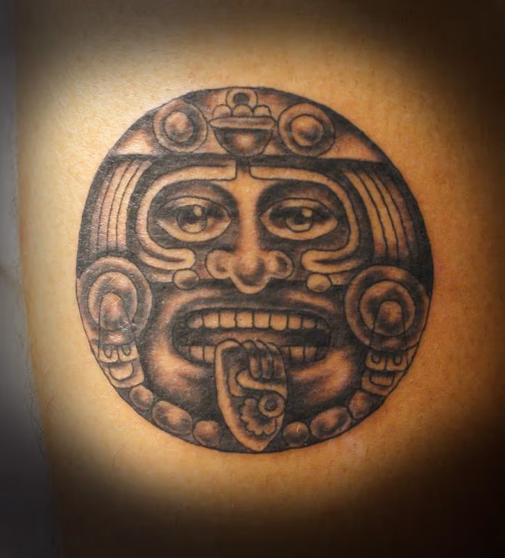 Black and grey aztec god