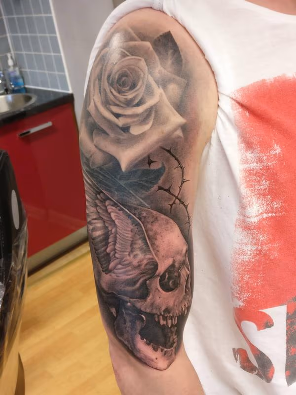 Rose and skull cover up