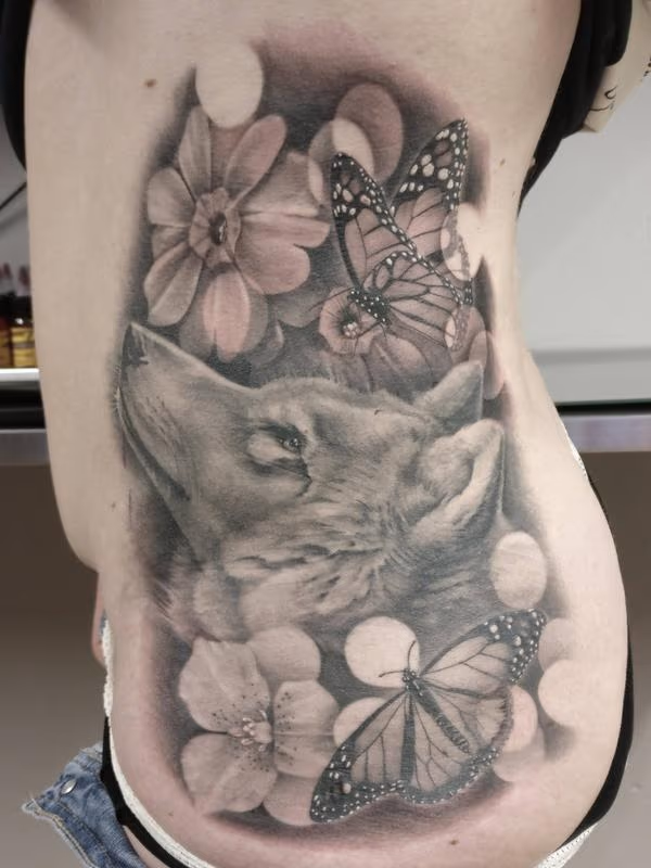 Wolf, butterflies and flowers