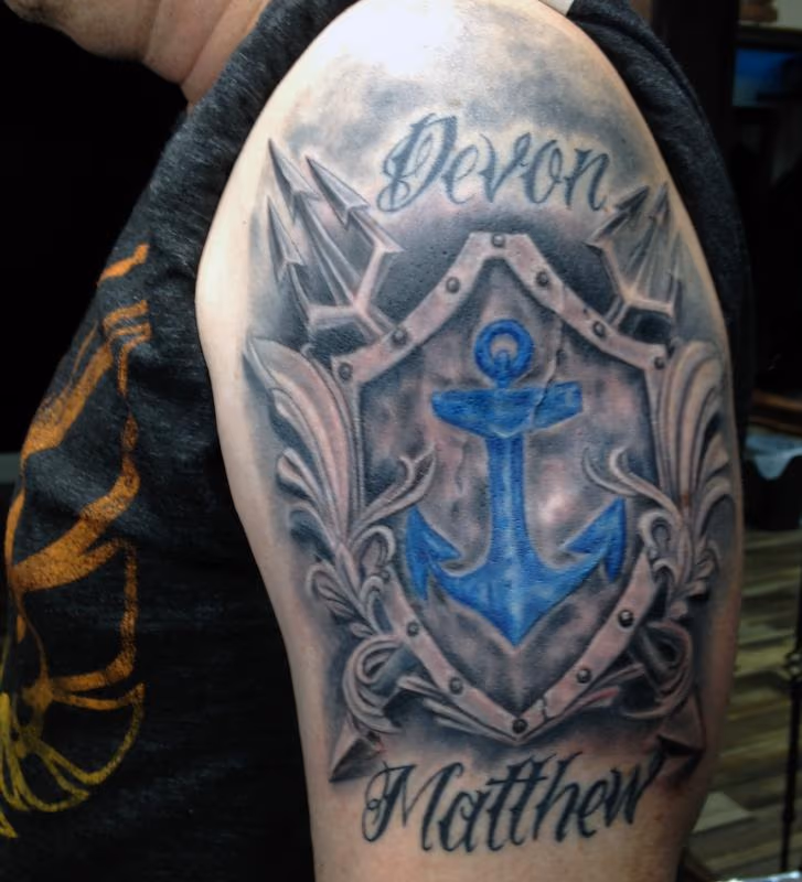 Family Crest Arm Tattoo
