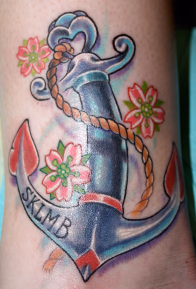 Color anchor and flower tattoo on an ankle. Super fun little tattoo done @ Stainedskin during my last guest spot.