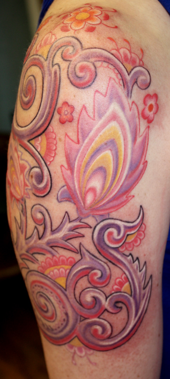 Ornamental arm tattoo