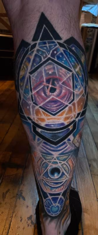 Geometric outerspace tattoo