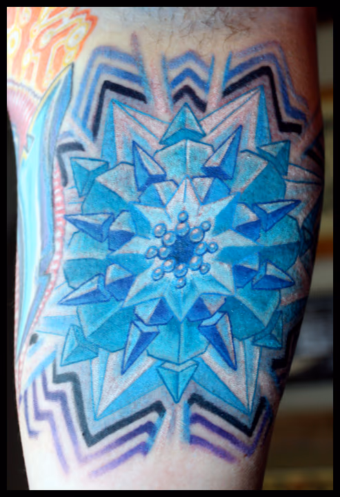 Mandala tattoo in the innerarm. custom color mandala tattoo