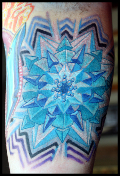 Mandala tattoo in the innerarm. custom color mandala tattoo