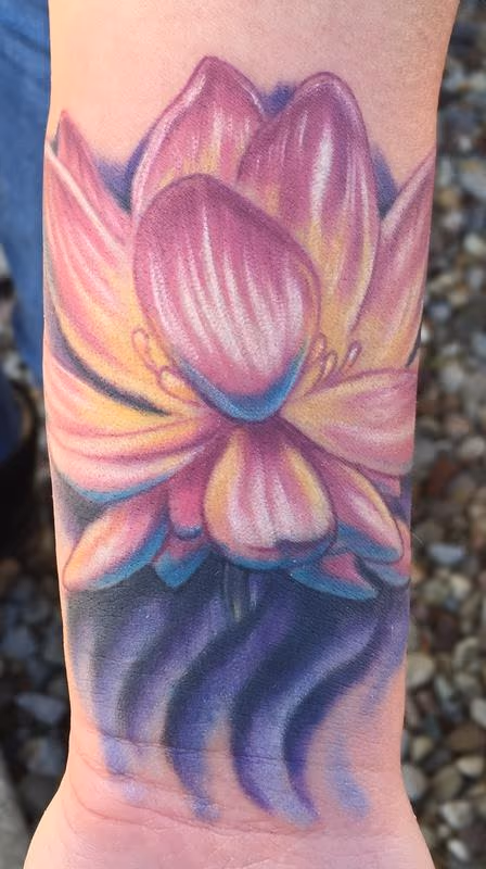 Lotus flower cover up tattoo